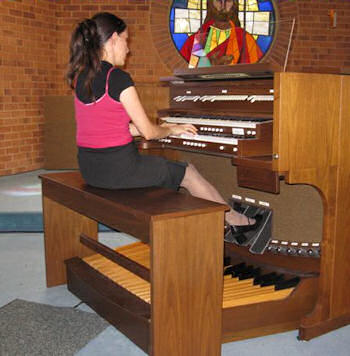 Jacinta Jakovcevic at the Renaissance 230 model Allen organ 