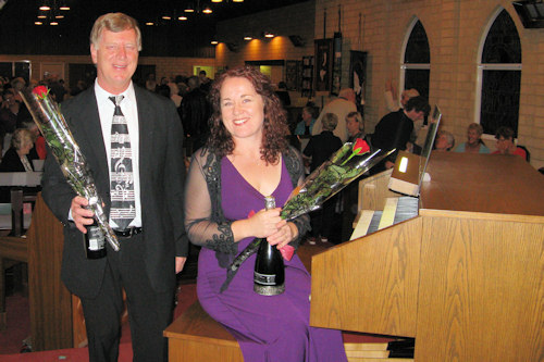 Angela Currie and Christopher Ryland at the organ installed at Christ's Church, Mandurah