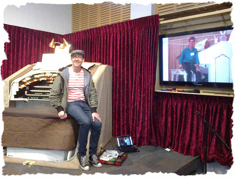 Chris McPhee at the Compton theatre organ in 2013 and (on the screen) in 1989